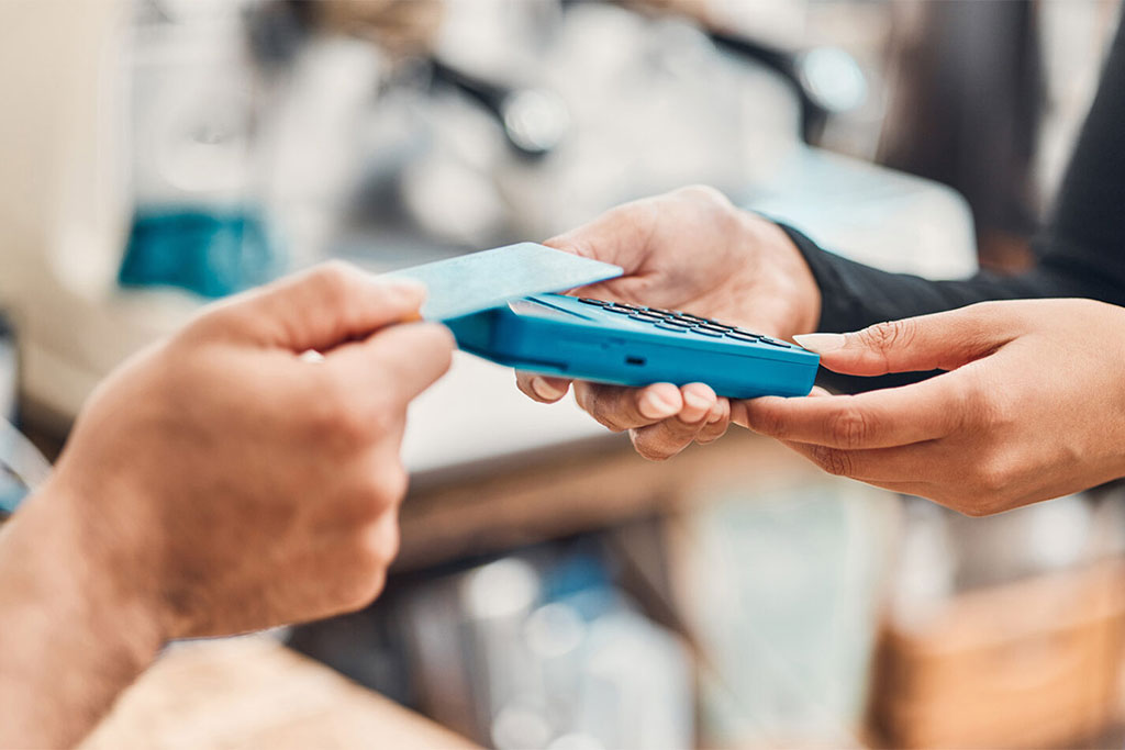 Person using a card for payment