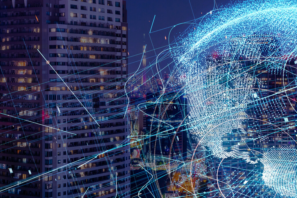 Globe overlayed on a cityscape