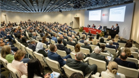 People seated in an auditorium