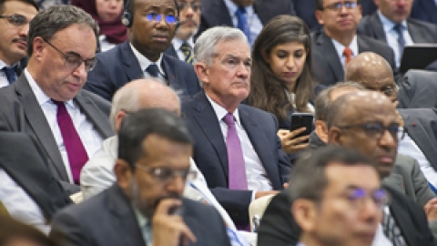 Group of people sitting in a room