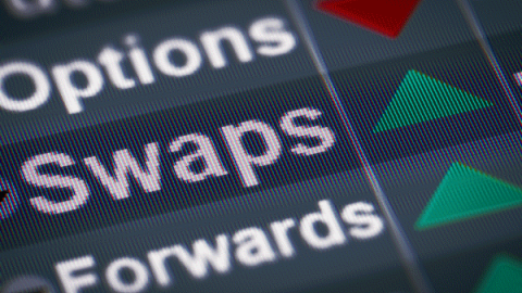 Close-up of a financial trading screen displaying terms like 'Options,' 'Swaps,' and 'Forwards,' with green and red arrows indicating market movements.