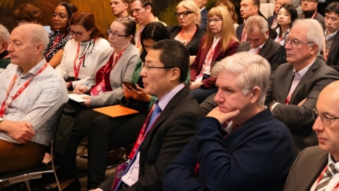 Group of people listening to a lecture