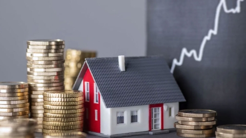 House, money and a line graph
