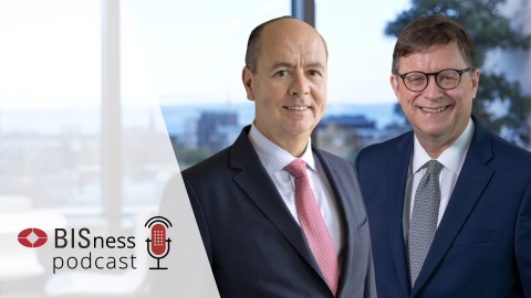 Gaston Gelos and Frank Packer with BISness podcast branding